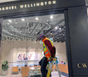employee climbing a ladder